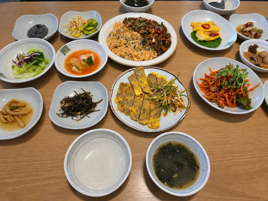 A table fully set with the beef jeon set spread