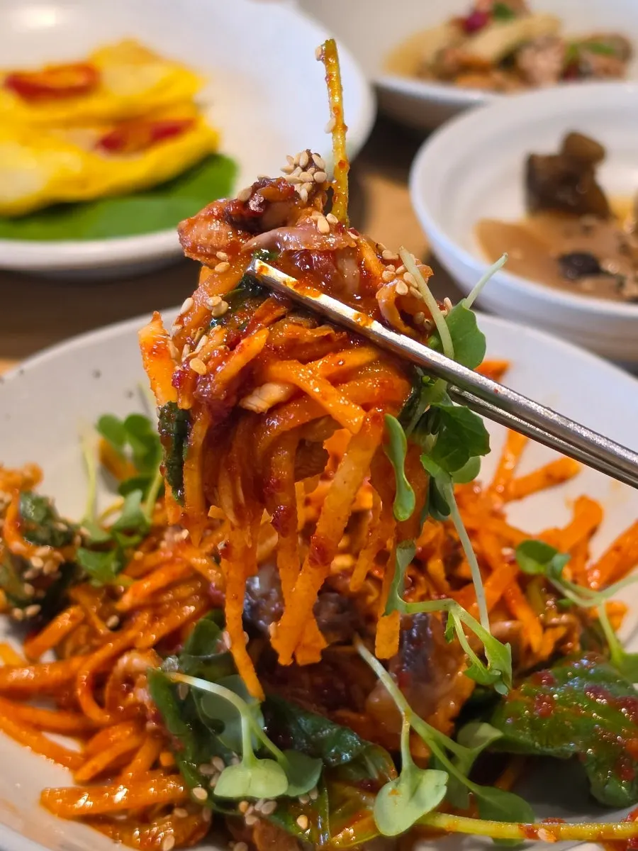 Cockle salad with julienned radish and cockles