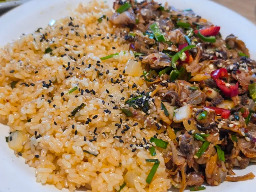 Wrapping beef jeon with scallion salad to eat
