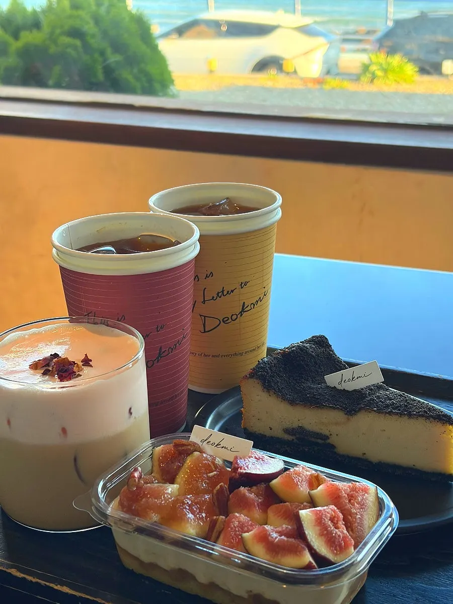 Tiramisu and cake samples inside the display case
