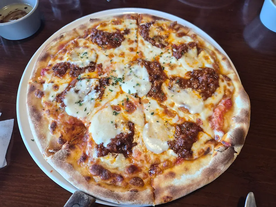 Riverside's signature ragu pizza, whole pie