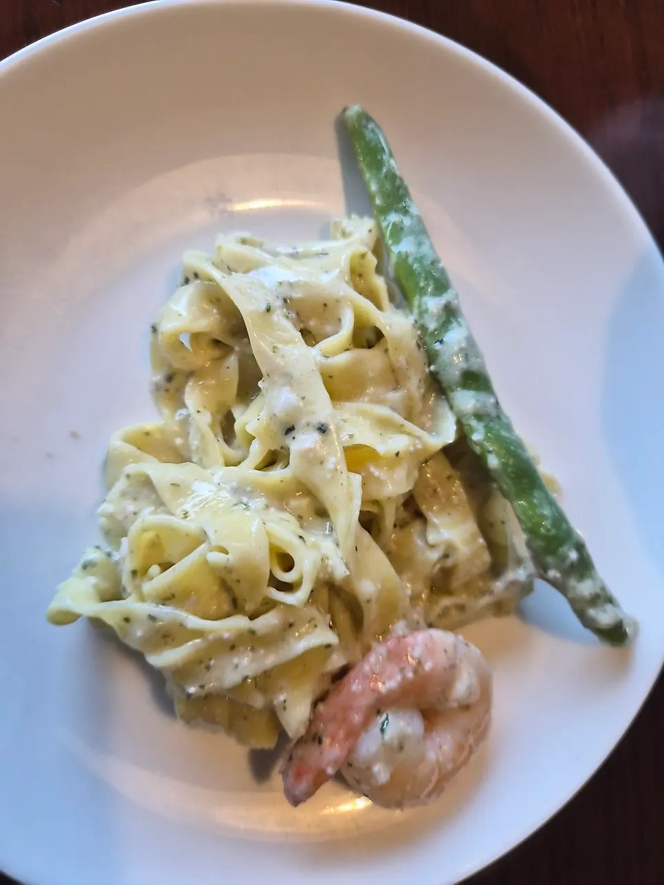 Handmade Gimmyeongran Pasta topped with shrimp and asparagus