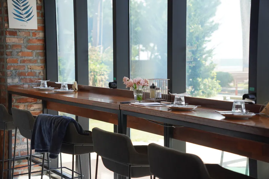 Restaurant hall with the open kitchen visible