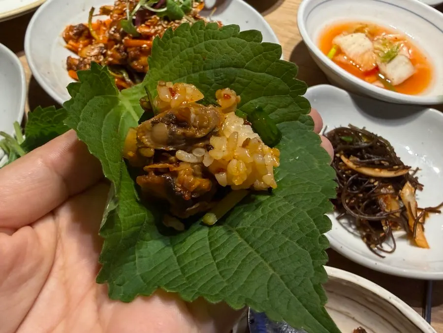 Cockle bibimbap shared with a child