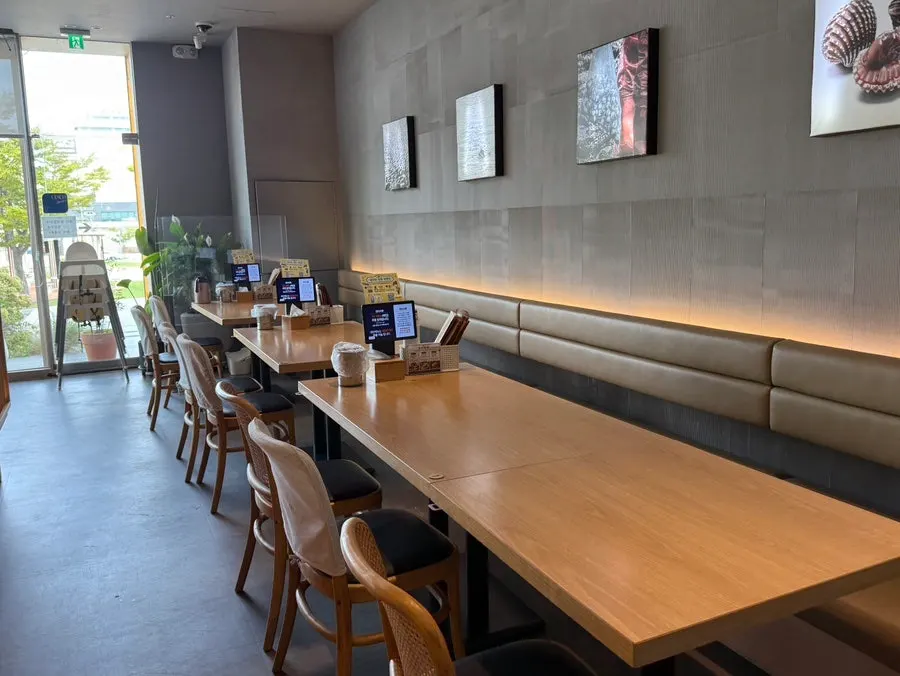 Restaurant interior with full-height windows