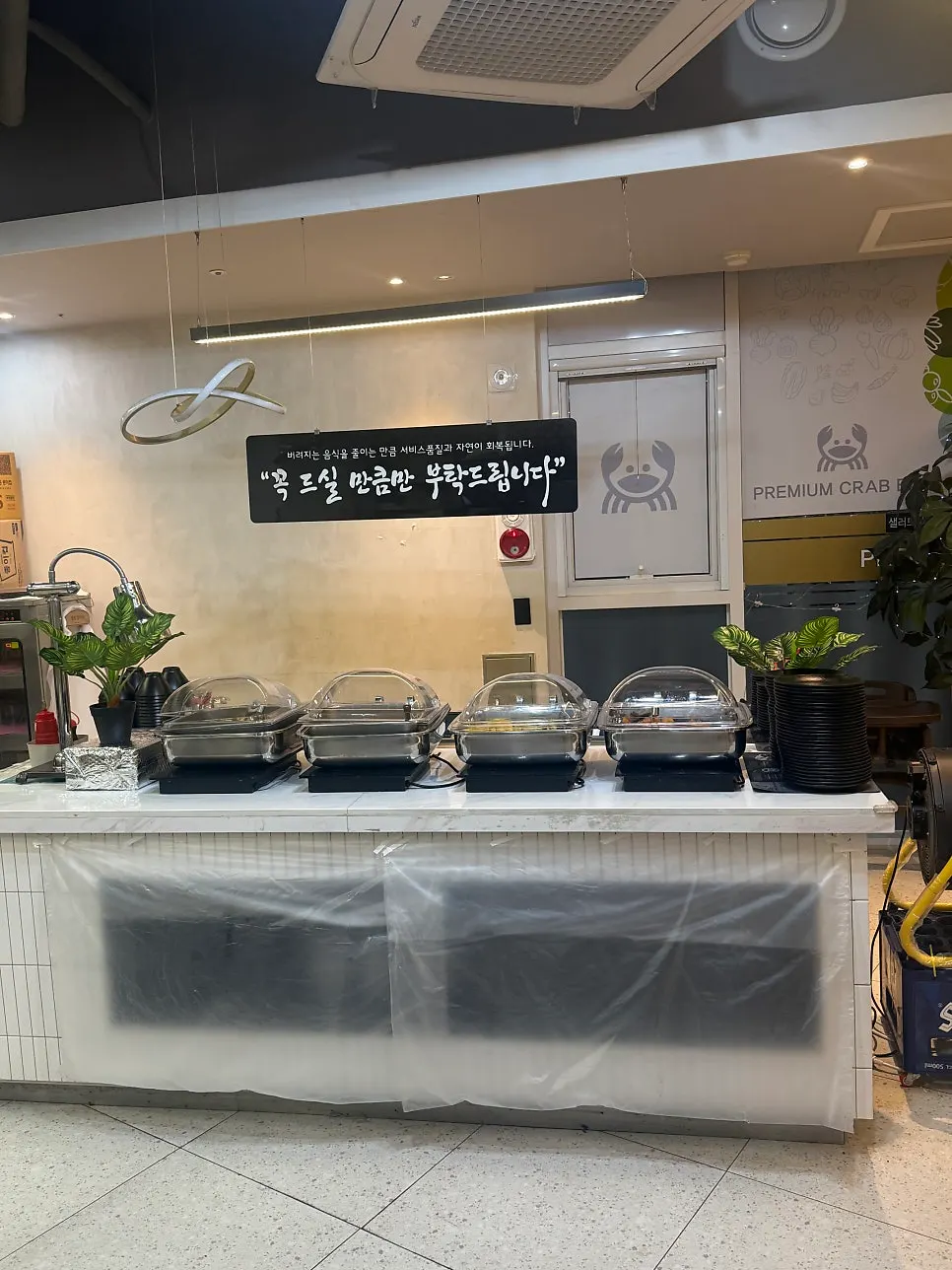 The dining hall of Gijang Myeongpum Daegae with wide table spacing