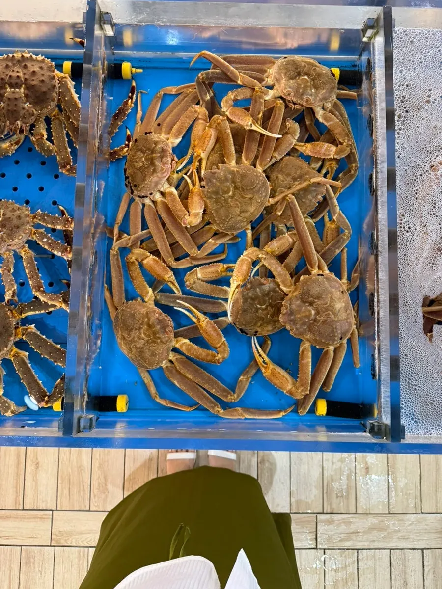Price board by crab grade at Gijang Myeongpum Daegae