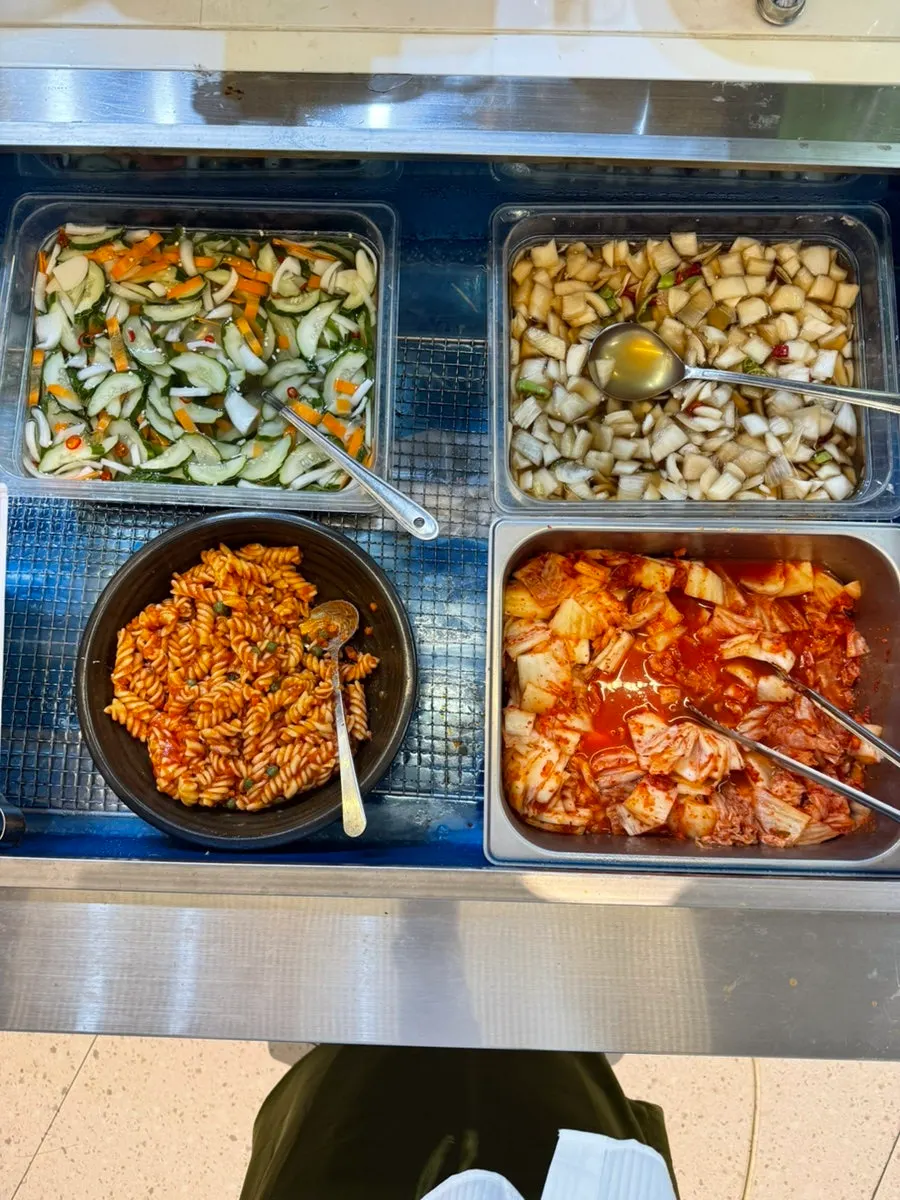 Basic side dishes at the self-serve bar of Gijang Myeongpum Daegae