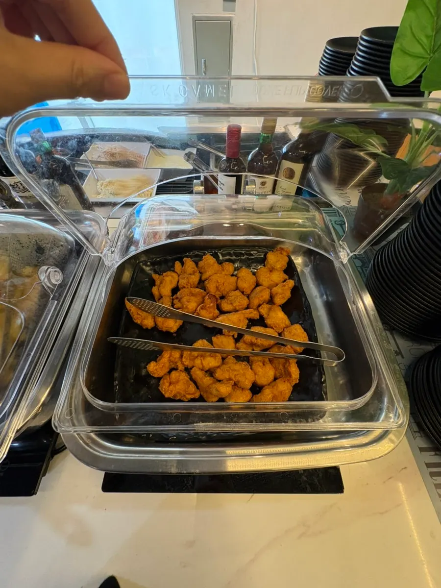 The self-serve side dish corner on the 2nd floor of Gijang Myeongpum Daegae