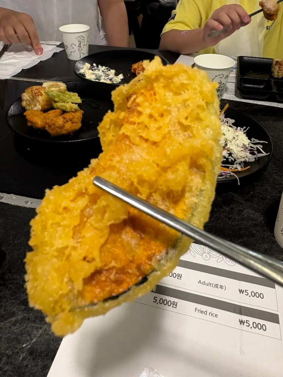 A plate of side dishes brought back from the self-serve bar