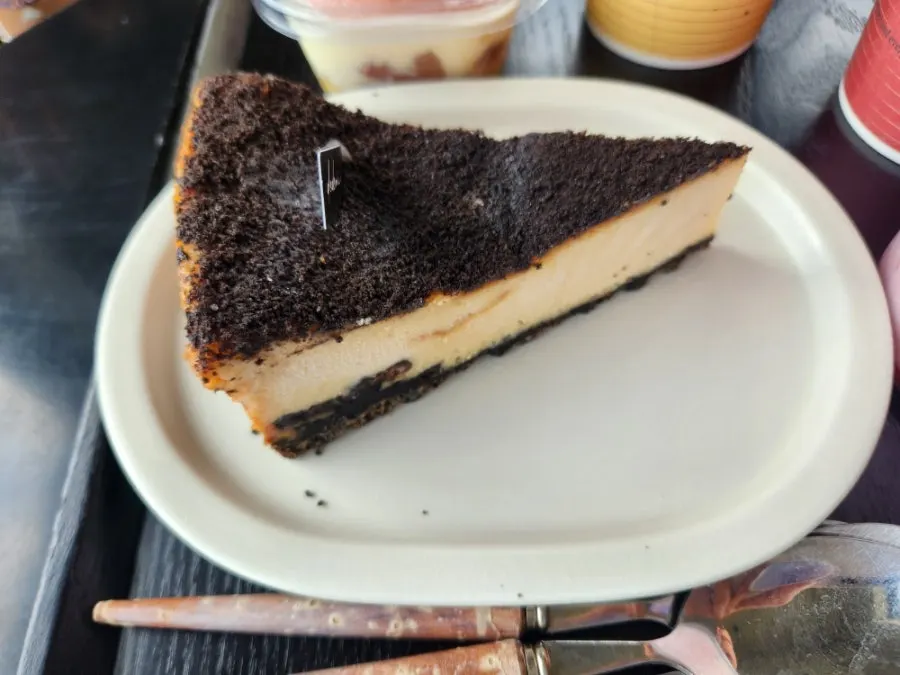 Cross-section of the tiramisu topped with peach
