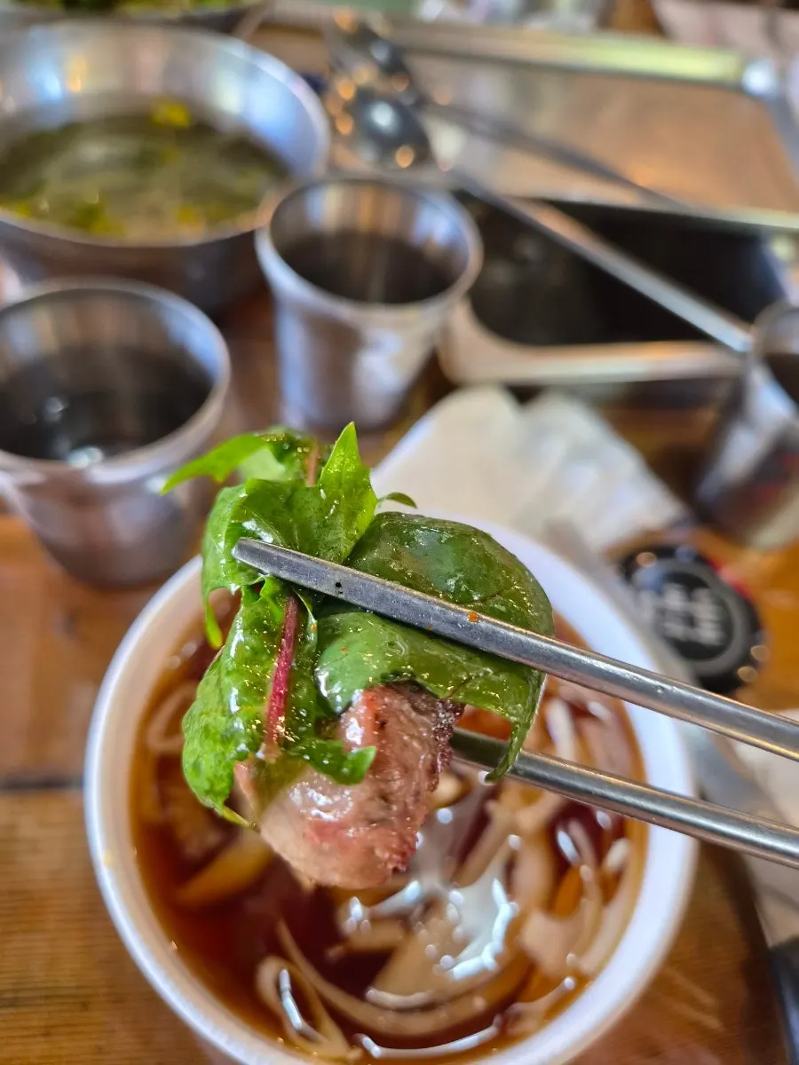 Grilled meat served with ssam vegetables