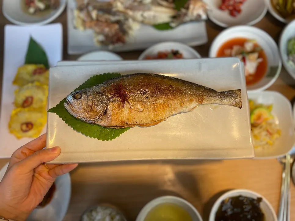 A large whole dried corvina fish