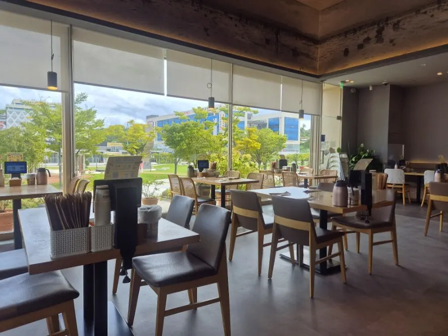 Bright seating area with large windows