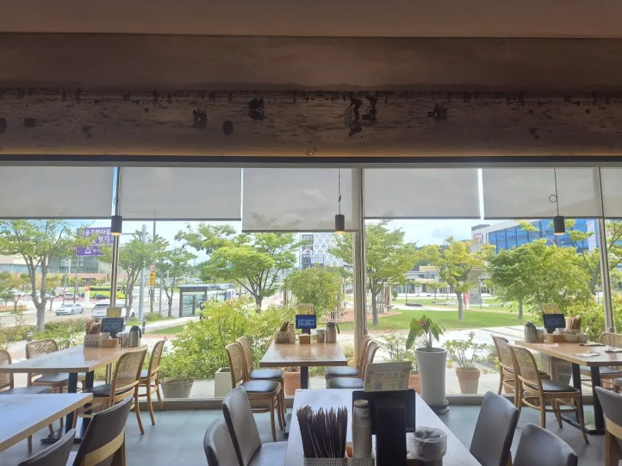 Overview of the restaurant with well-spaced tables