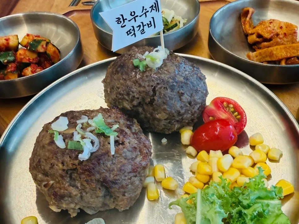 Two plates of hanwoo tteokgalbi and Dongam tteokgalbi