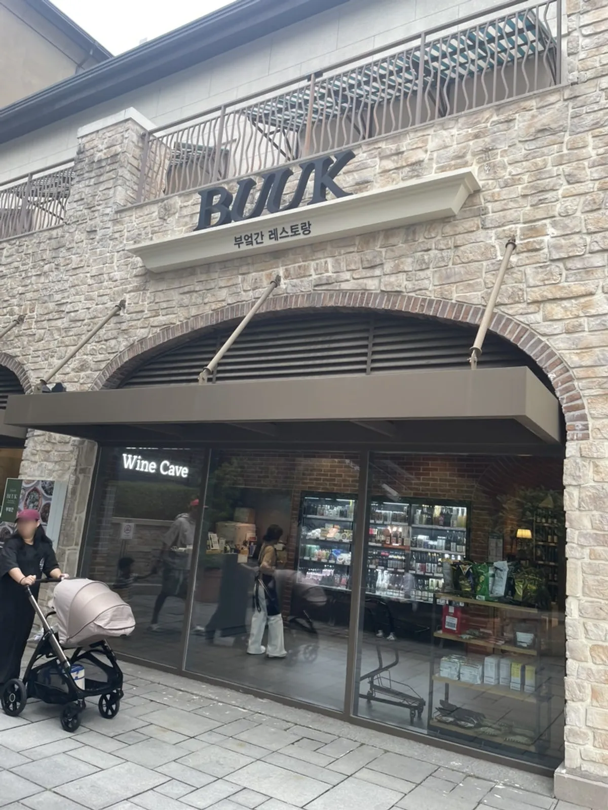 Brick and arched exterior of Bueokgan's Gijang outlet branch