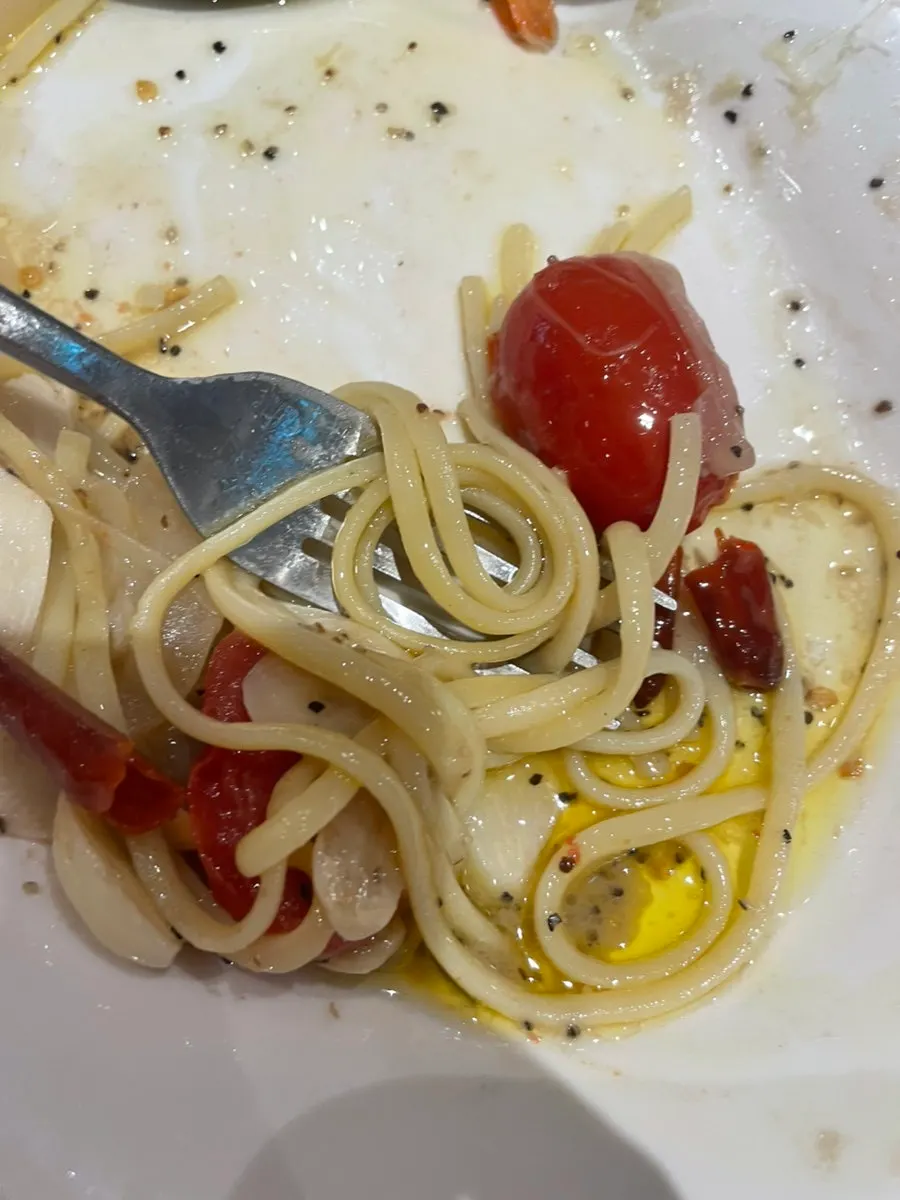 Shrimp anchovy oil pasta topped with big shrimp