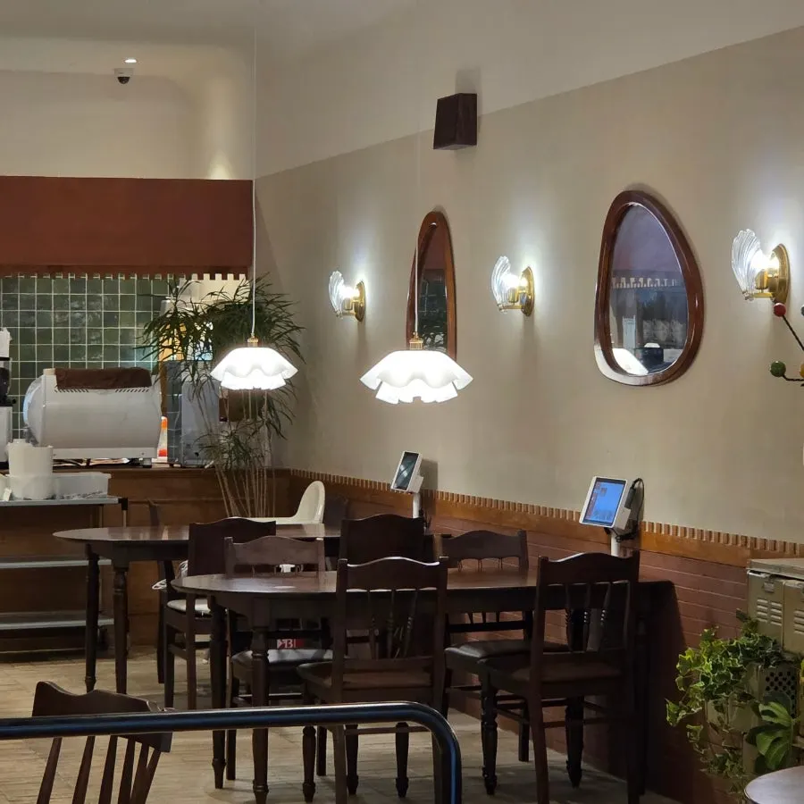 Bueokgan's dining hall with lit tables