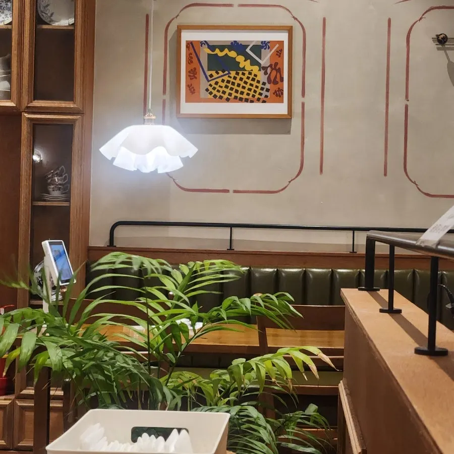 Dining hall with vintage lighting and mirrors