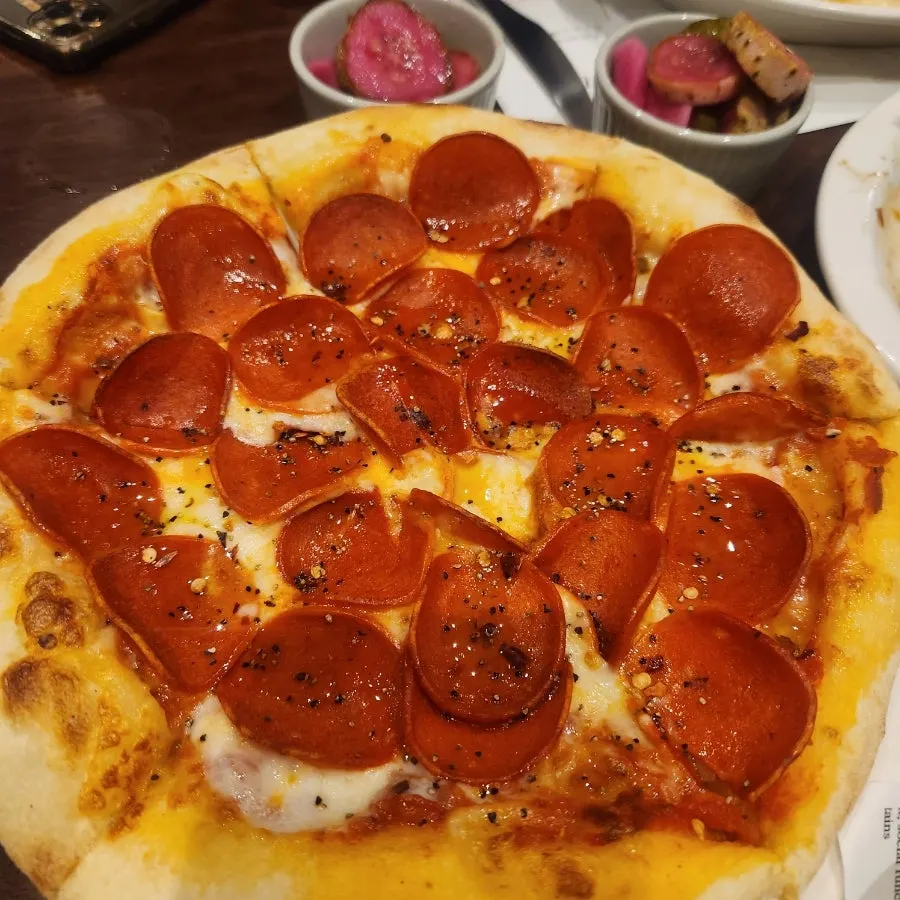 Pepperoni pizza generously topped with pepperoni