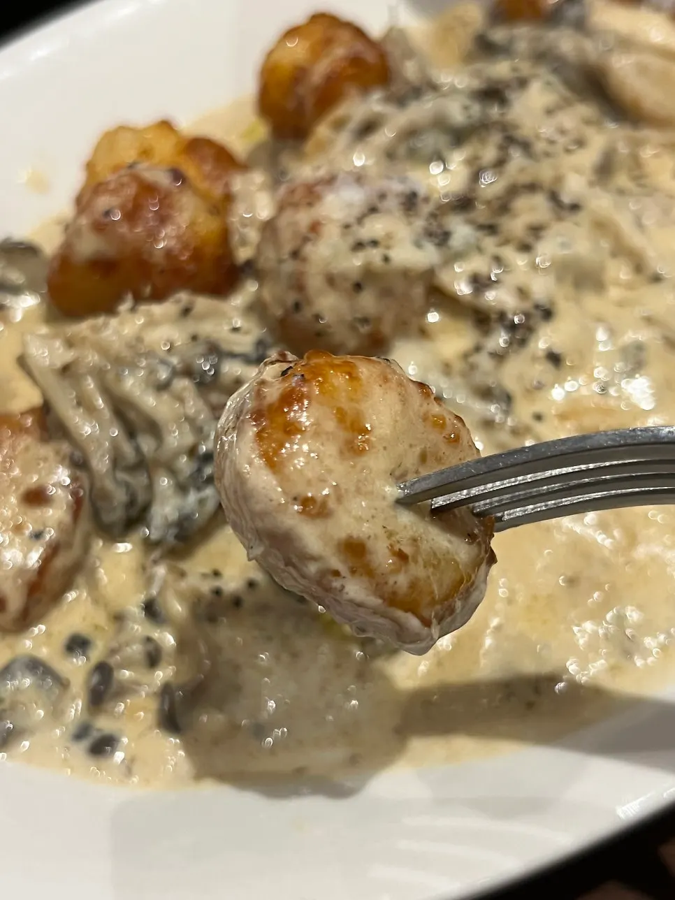 Potato gnocchi in thick cream sauce