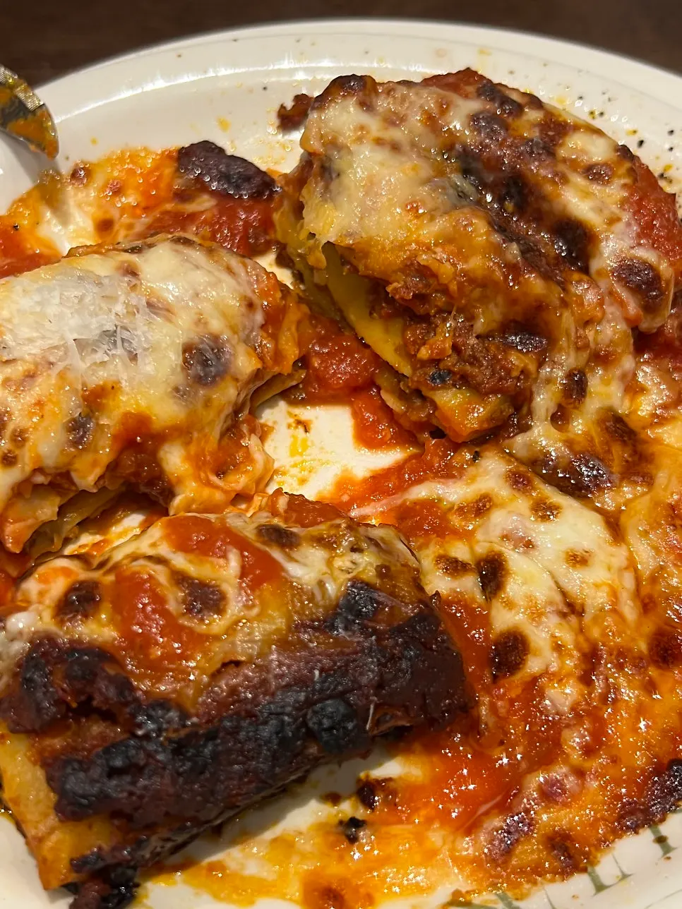 Lasagna topped with baked cheese