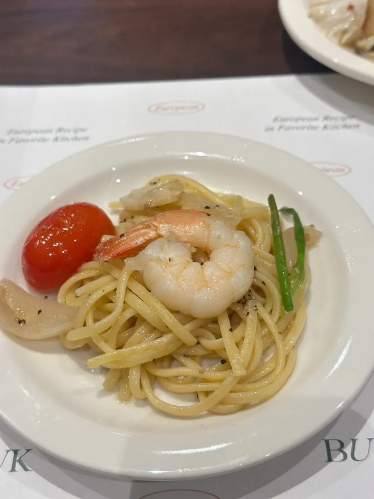 Salad, pasta, and risotto all together on the table
