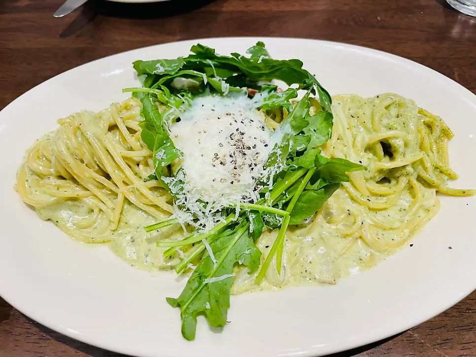 Close-up of the thick, rich basil pesto cream pasta sauce