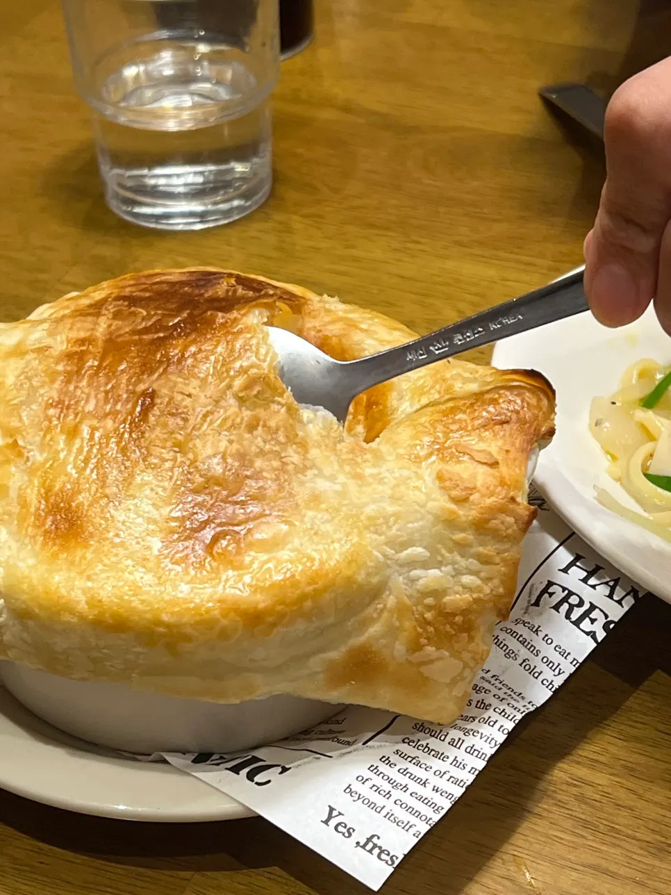 Sweet pumpkin soup topped with pastry