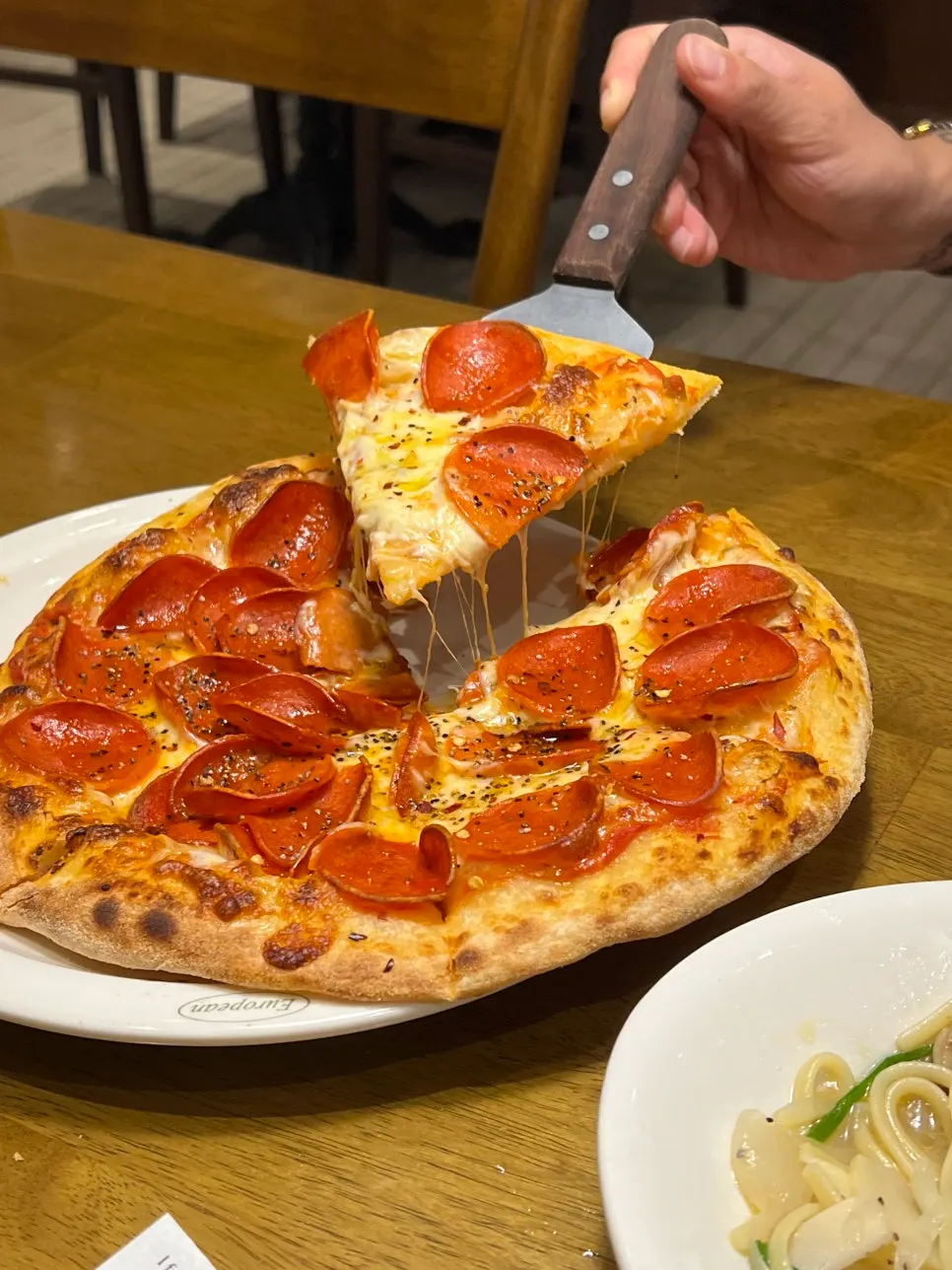 Pepperoni pizza enjoyed with cheese