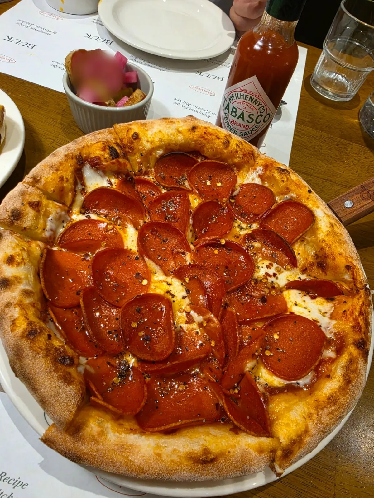 Bueokgan's pepperoni pizza loaded with toppings