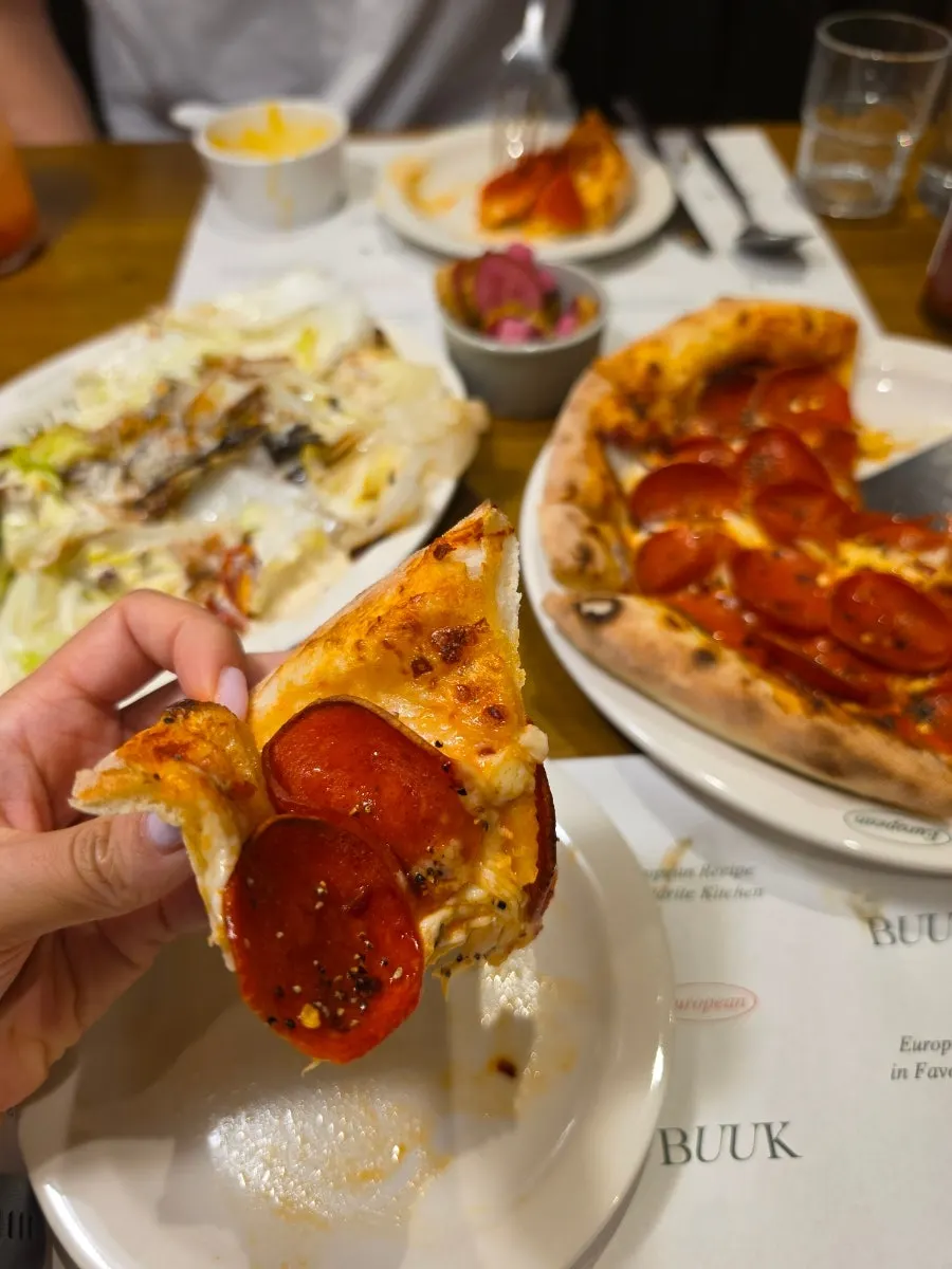 Eating the pepperoni pizza