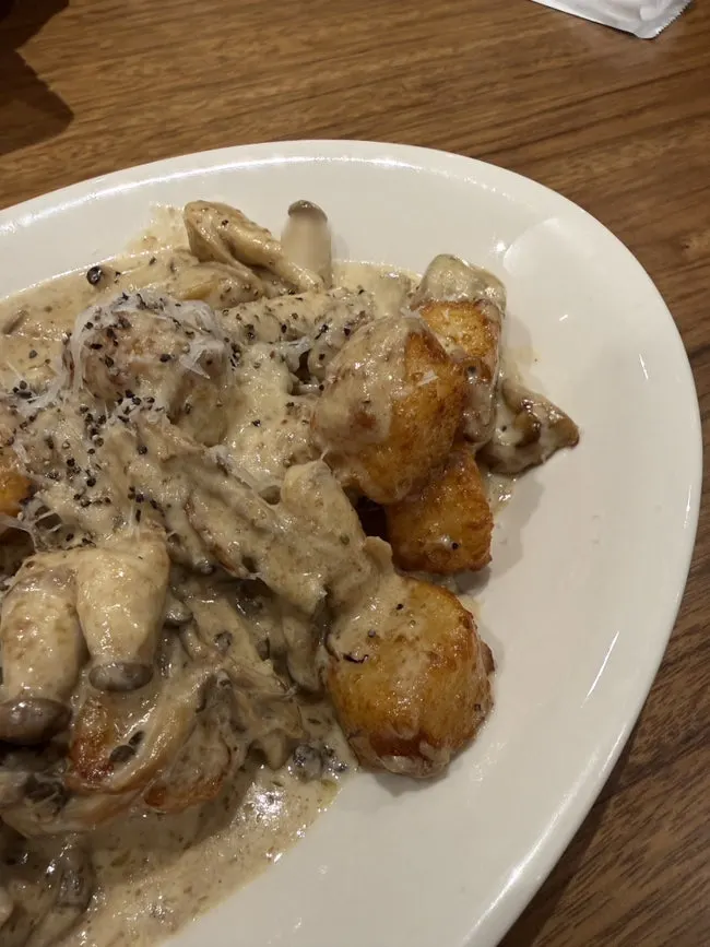Shrimp anchovy pasta topped with five shrimp