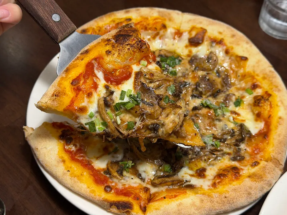 Truffle mushroom pizza piled high with mushrooms