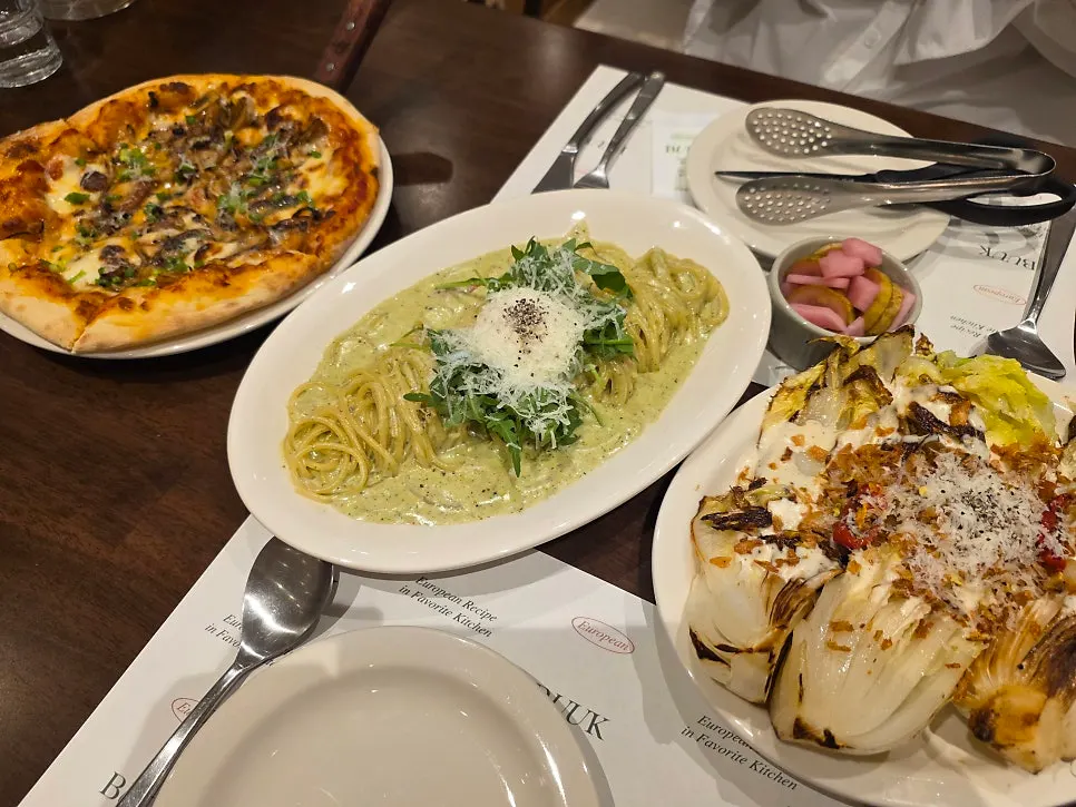Order of basil pesto cream pasta, salad, and pizza