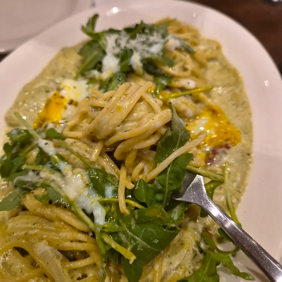 Basil pesto cream pasta with a well-balanced texture
