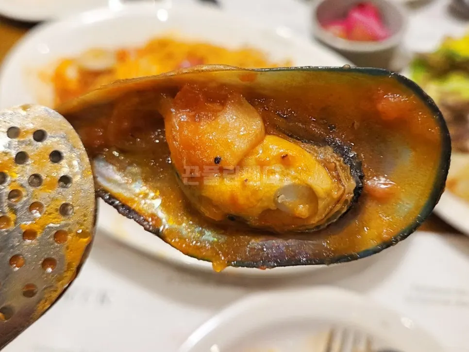 Seafood tomato pasta generously coated in sauce
