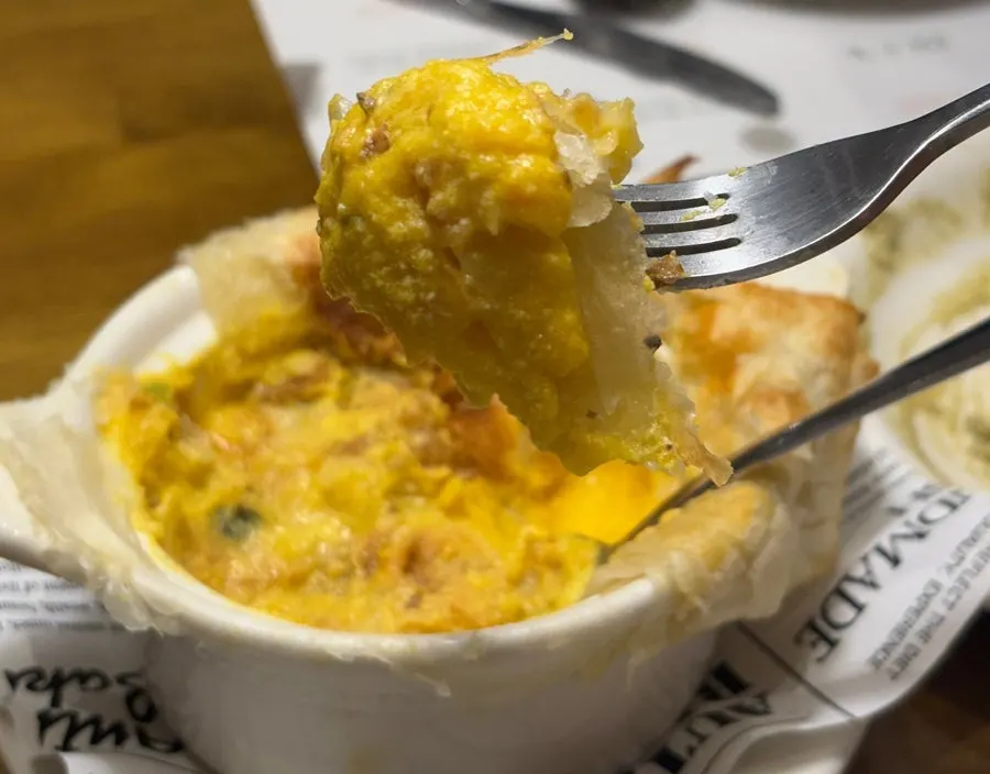 Bread dunked into the pastry soup