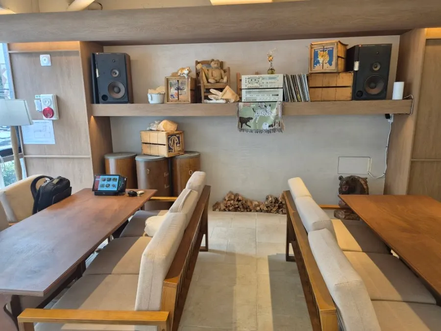 Wide, continuous seating area of the café