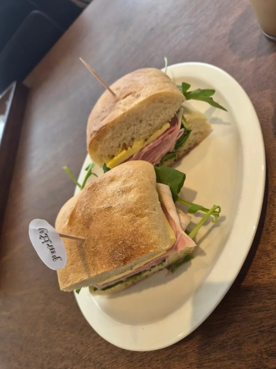 Table set with sandwich and bakery items together