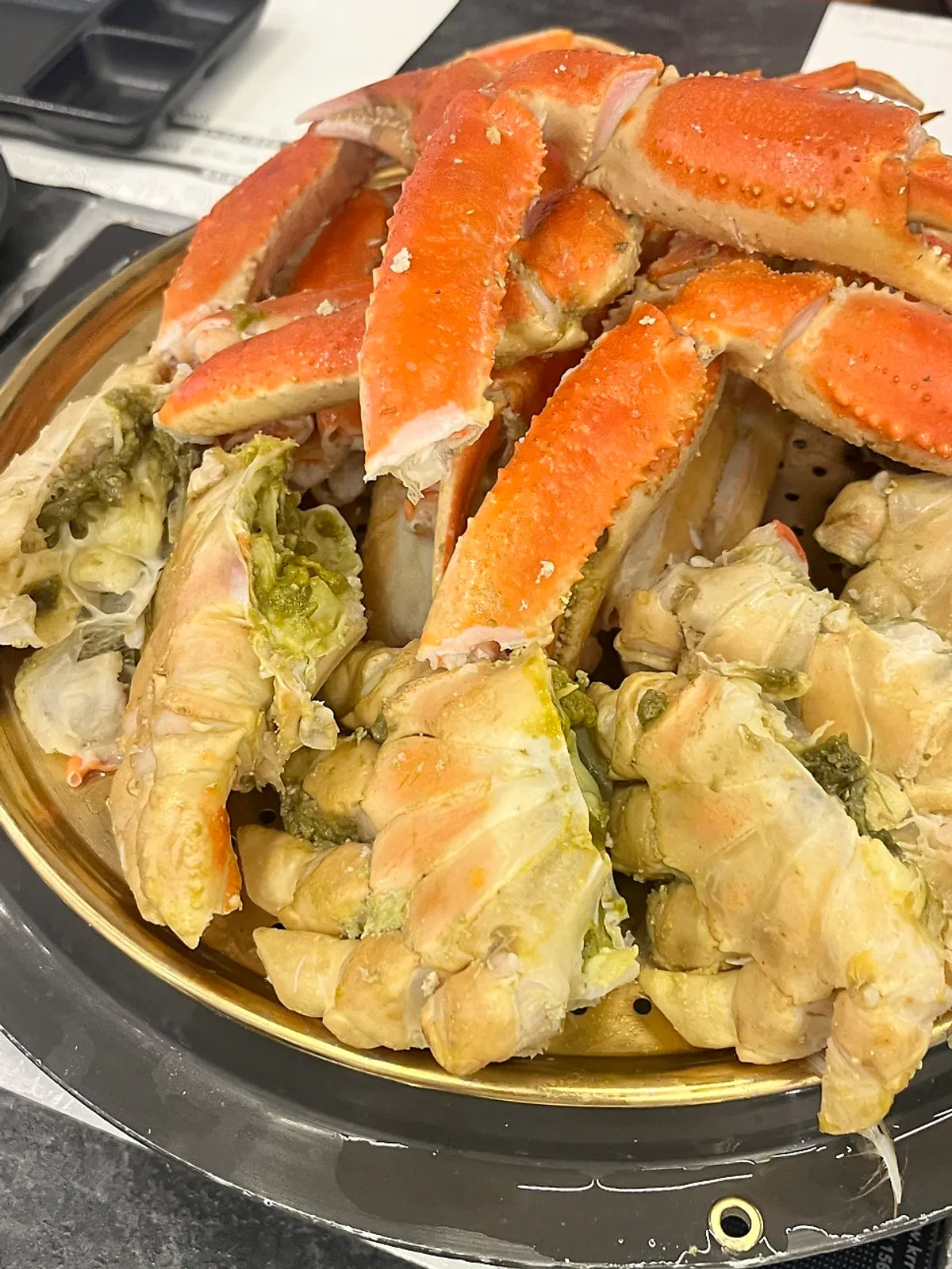 A full spread of prepped, steamed snow crab