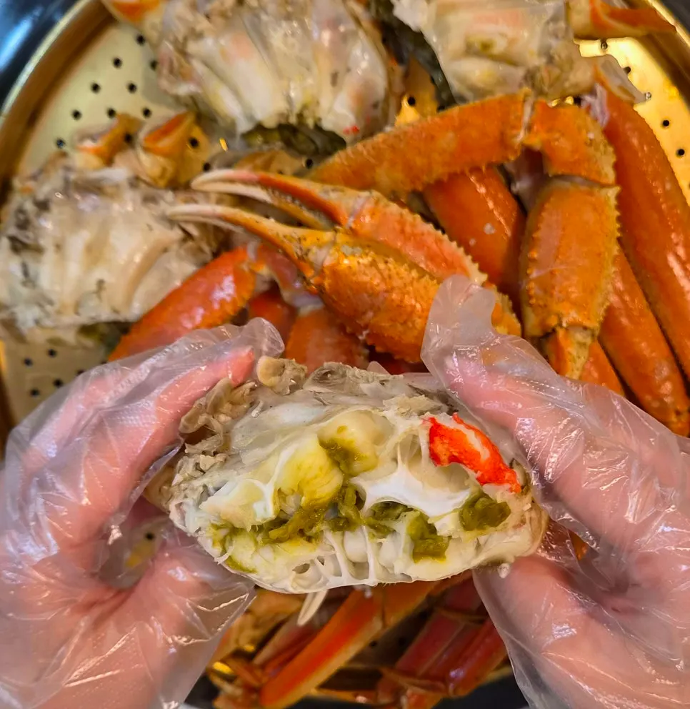 Picking meat out of the crab