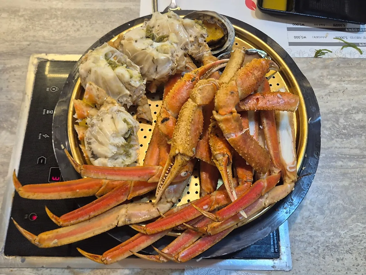 Gloves on and ready to eat crab