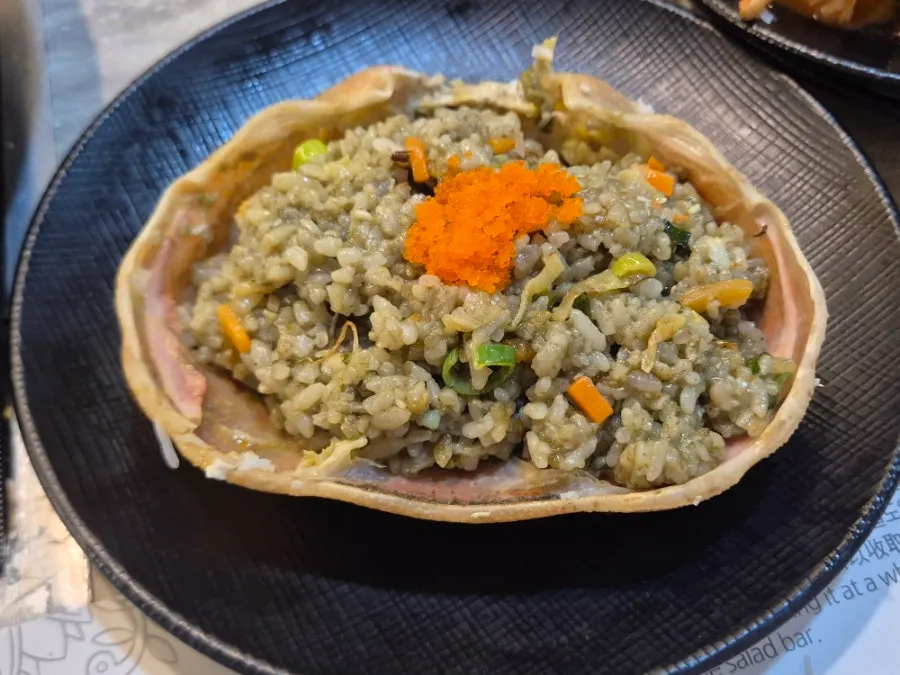A pile of crab shells left after finishing the meal