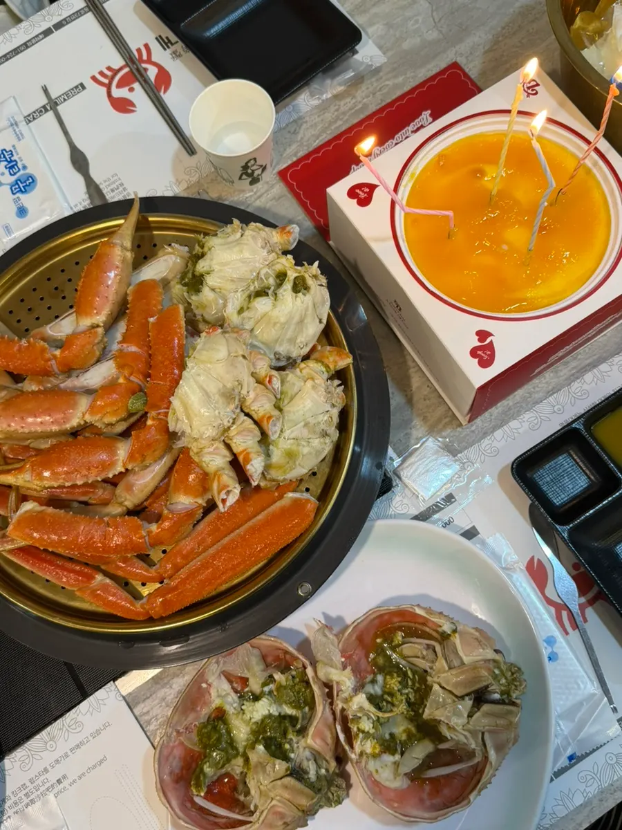 Steamed snow crab served at the table