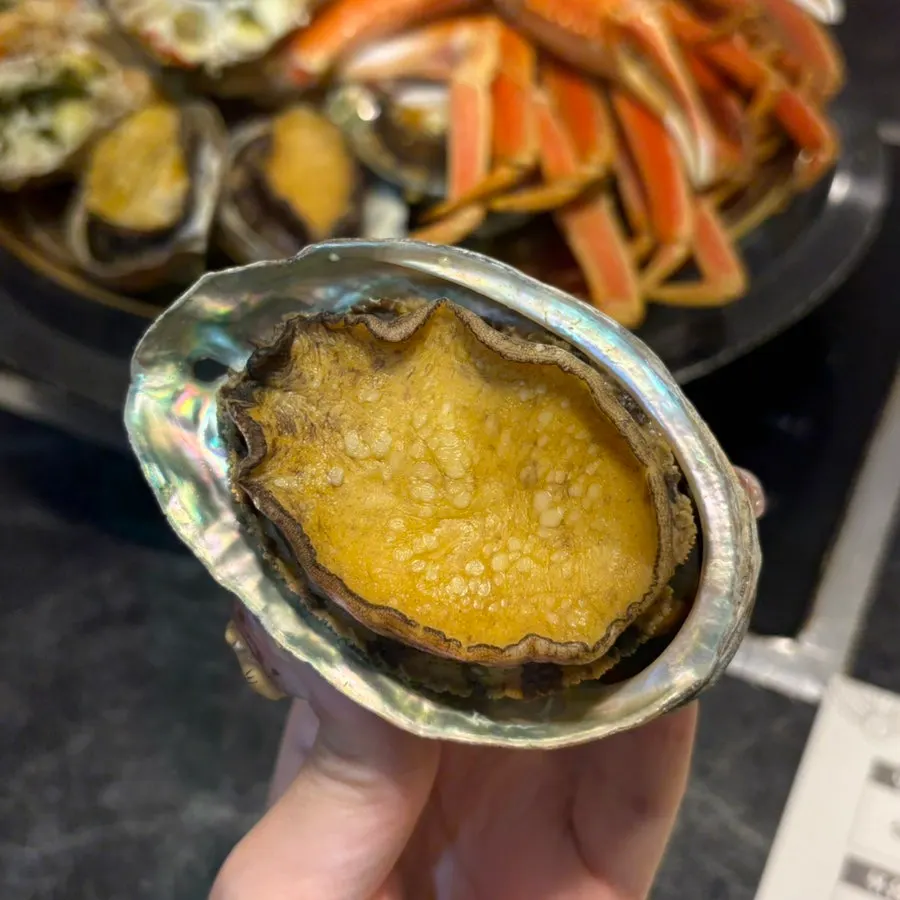 Grilled abalone served as a complimentary item