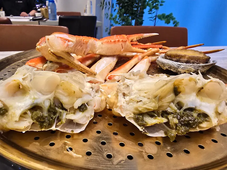 Snow crab leg meat cut for easy eating