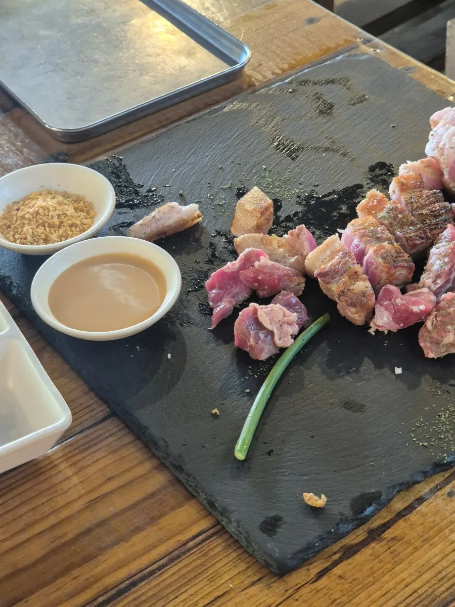 Grilled meat plated together with ssam vegetables