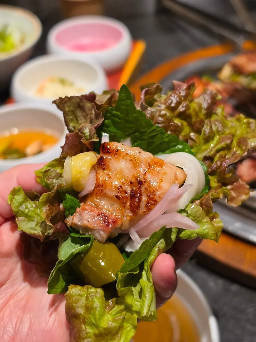 Pork ribs in a lettuce wrap with wasabi